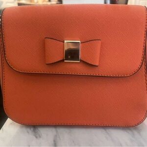 Elegant Orange Crossbody Bag with Bow Accent
